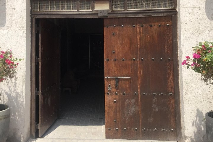 Step into history through this inviting doorway leading to the rich heritage of Sharjah. Explore traditional architecture and discover the essence of UAE's past in every detail.